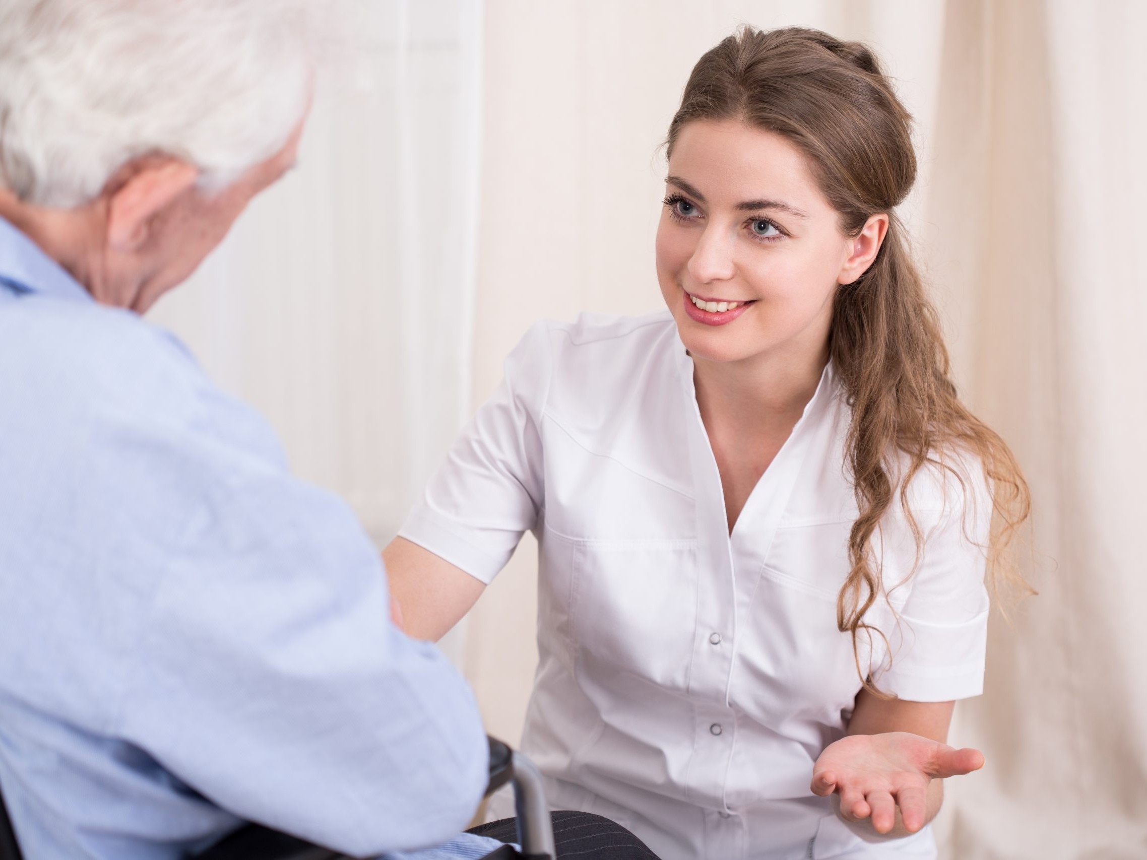 caregiver_explaining_to_patient